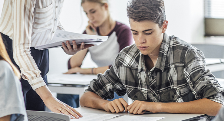 Student taking a dual enrollment class to save for college.