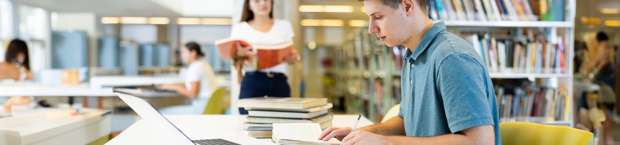 A student studying in a library.