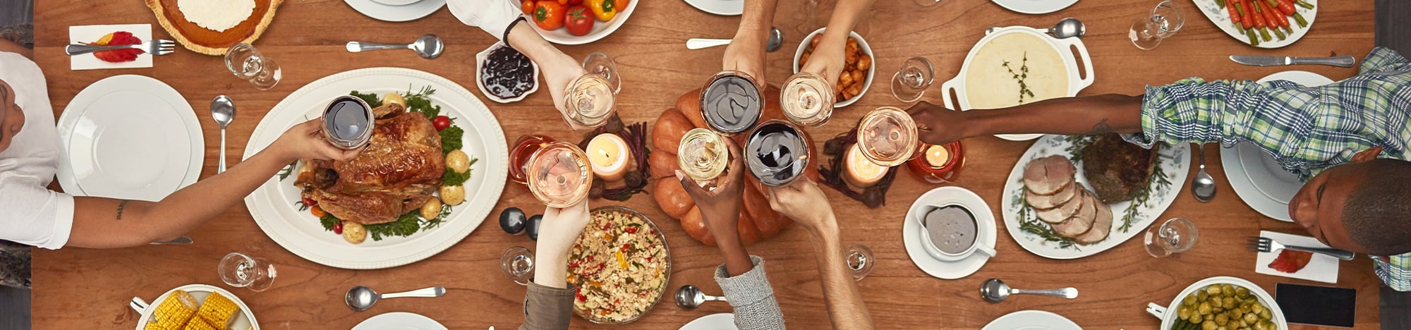 Students having Thanksgiving dinner together.