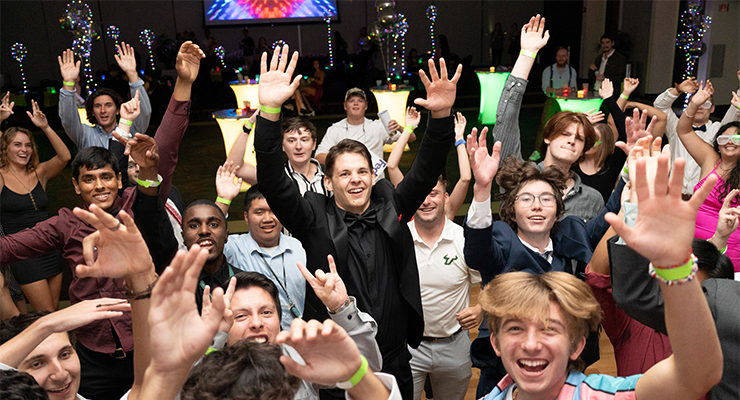 A group of students having a good time at a party.