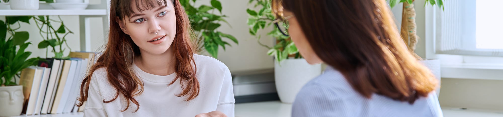 A student talking to her high school counselor.