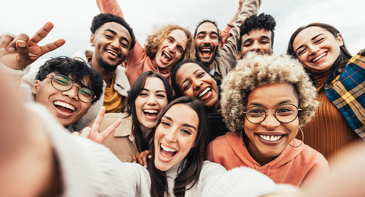 Group of college students taking a selfie.