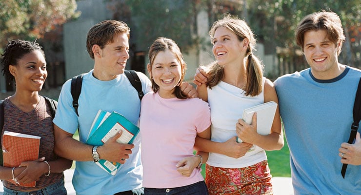 high school students walking to class together