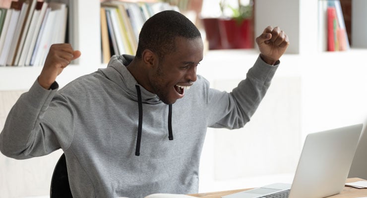 A student celebrates completing his senior year checklist and getting accepted to college.