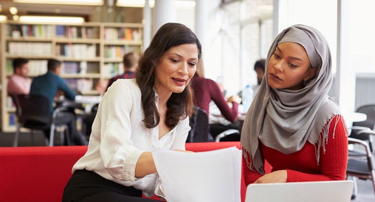 College counselor talking with student