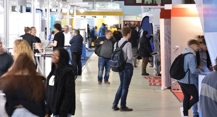 Students at a college fair 