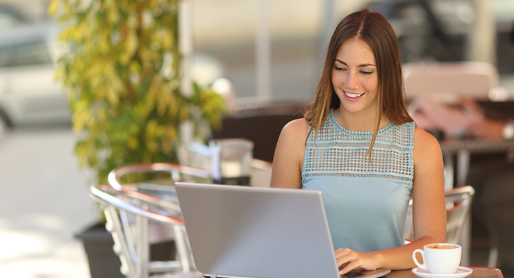 Woman applying to USF on her computer.