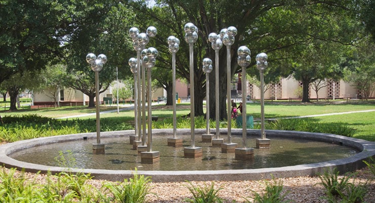 USF on-campus water molecule art sculpture.