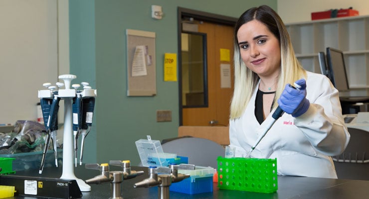 USF student working in a science lab