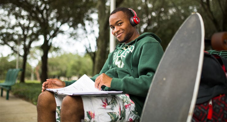 USF student studying on campus.