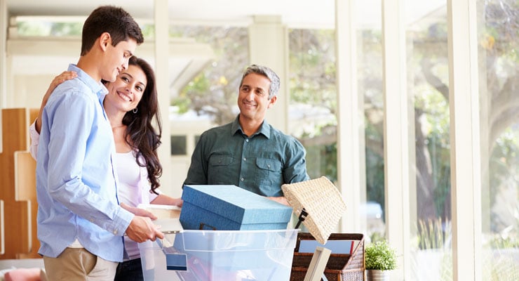 College-bound student and parents packing the student's things for college.