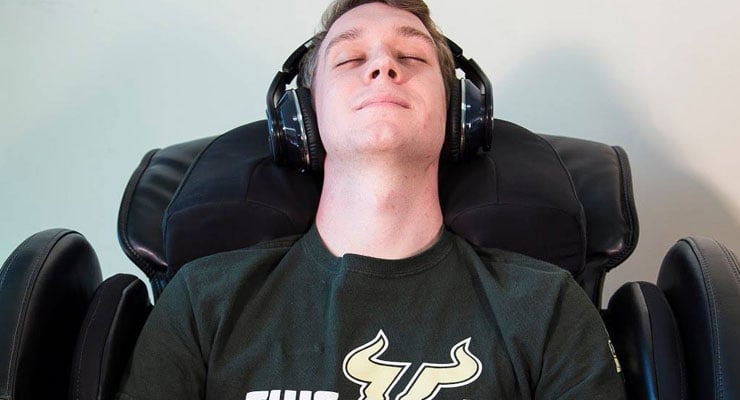 USF student using a relaxation technique.