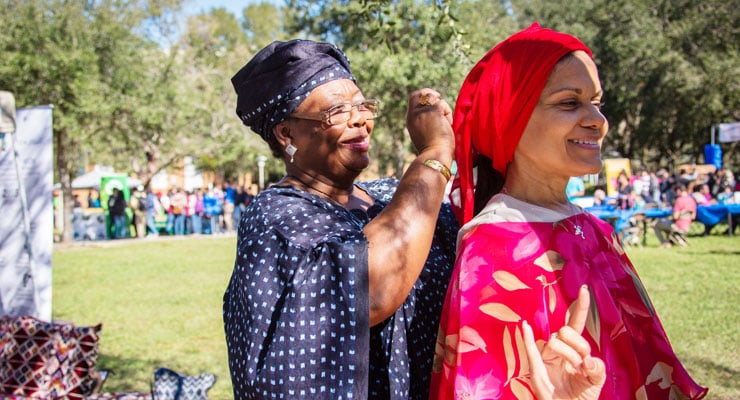 USF staff members participate in a multicultural event at USF.