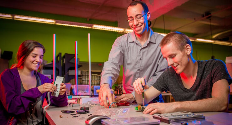 USF engineering students work on a project together. 