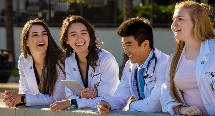 Four USF medical students hanging out together.