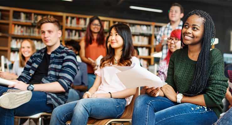 A row of honor students in class.