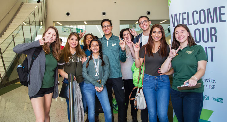 USF staff and prospective students and family members attend an event at USF.