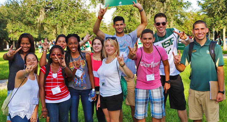 A group of high school students taking an on-campus tour of USF