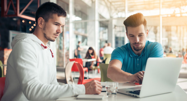 Friend helping student