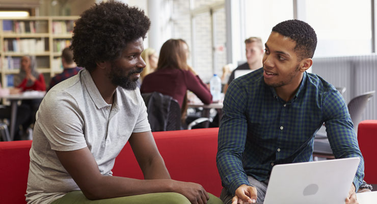 A parent and a student talk about researching colleges based on the counselor's advice.