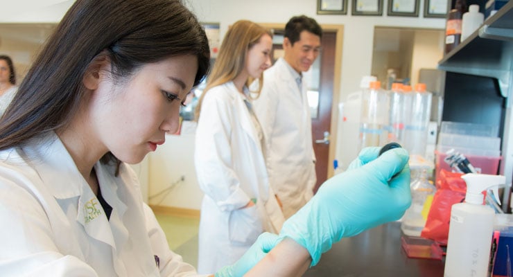 USF students in a health or medical type major in the lab