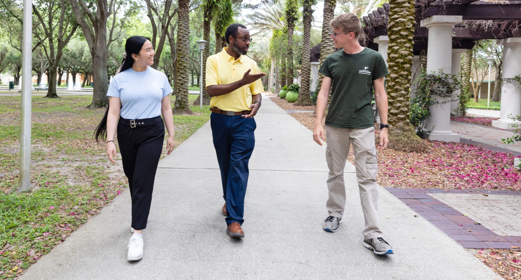 Honors College students walking around campus.