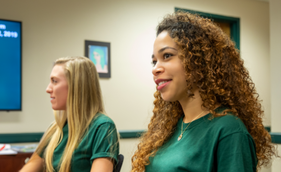 Newly admitted USF students listening to a presentation about the cost of attendance.