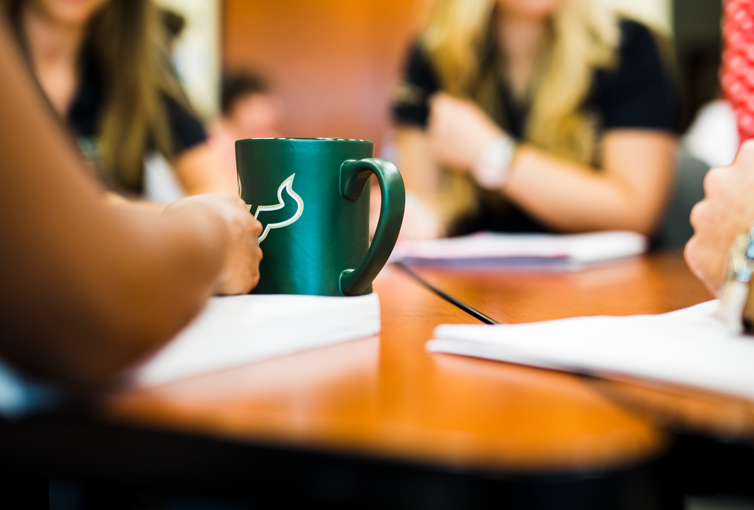 USF students gathered at a table.